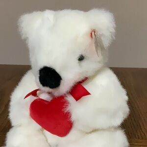 Ty Romeo holding stuffed red heart ♥️ Valentine 💘 stuffed bear